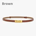 Slim genuine leather women's belt in brown with a refined gold rectangular metal buckle - Brown