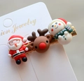 Detailed set of Christmas hair clips featuring reindeer, snowman, and Santa on white card - Style 17 Christmas Hair Clip