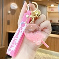 Cute pink luminous quicksand lollipop keychain with a Good Luck strap and golden bell - Noctilucent Bubble Bead Lollipop-Pink