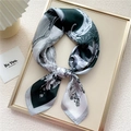 Elegant emerald green silk scarf with white lily floral print and smooth satin texture - Black/Green Violin Flower