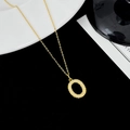 Elegant gold letter O pendant necklace with sparkling zircon pavé on a thin chain - Letter O