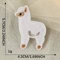 Embroidered white alpaca patch for clothing with dimensions 5.7cm by 4.3cm - White Alpaca