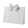 Minimalist white resin jewelry display stand with elegant 3D ribbon bow ornament - White