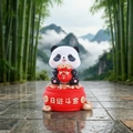 Resin panda figurine holding a red money bag with gold base for car dashboard decor - 1081-12 Prosperity Panda