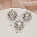 Detail view of heart pendants with white pearls and zircons measuring 23mm by 20mm - 529# Silver - White Zirconia