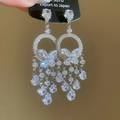Dettaglio di orecchini a nappa in argento con zirconi a farfalla e a goccia su etichetta - Bianco-Orecchini a Clip