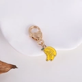 Creative zinc alloy keychain with yellow enamel banana charm and golden heart clasp - Letter Small Banana