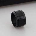 Matte black stainless steel spinner ring with engraved sutra text and meander patterns - Style A Black