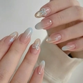 Close-up of nude gradient blue press-on nails with 3D bows and star rhinestones - Simple and Elegant Style (BY2001) / Handmade Nails (Size M/10 Pieces)