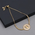 Détail du bracelet religieux doré ajustable avec médaille Marie et oxydes de zirconium - Chaîne Box Perles Vierge Marie