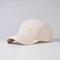 Detail view of a cream 5-panel soft crown baseball cap with a short brim design - Adjustable / Beige