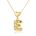 Macro detail of golden heart pendant and 3D letter E with colorful cubic zirconia stones - Letter E