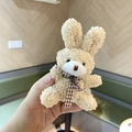 Cute beige plush rabbit with bow tie, soft lamb wool texture mascot for backpacks - Beige Rabbit