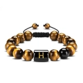 Macro shot of 10mm tiger eye beads bracelet with a black square bead featuring the letter H - Letter H