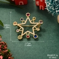 Star-shaped gold brooch with colorful gems and size specifications in a Christmas setting - Gold Star Shape Multicolor Zirconia Brooch