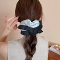 Elegant blue and black satin scrunchie with lace trim worn on a braided hairstyle - Blue and Black Patchwork Satin (33#)