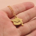 Golden graduation cap necklace with fine tassel detail on a delicate cable chain - Gold