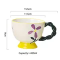 Hand-painted 400ml ceramic mug with purple flower, yellow base and green handle - Windmill Flowers