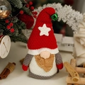 Handmade knitted Christmas gnome with red star hat, green bell and brown beard - Red Standing Hat