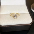 Top view of an 18K gold plated bow ring with a rectangle crystal in a gift box - Rectangular Halo Zirconia Ring (5#)