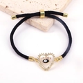 Bracciale moda a cuore malocchio con zirconi su cordino nero intrecciato regolabile - Nero