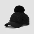 Detail of kids black fleece baseball cap with large faux fur pom-pom and sleek flat brim - 54cm (3-8 Years) / Fur Ball Style / Black