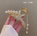 Elegante pinza de pelo de lirio de los valles con perlas y borlas largas doradas - Tulipán Flequillo