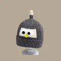 Dark gray knitted winter hat for babies featuring a cute penguin character design - Bird Hat Gray (2 Months - 2 Years Old)