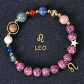 Macro detail of 8mm beaded Leo zodiac bracelet with blue stones and star charm - Leo-B