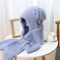 Close-up of thick cable knit lavender hooded scarf with soft thermal texture on a desk - Haze Blue
