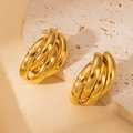 Polished gold multi-layer semi-circular stainless steel earrings on a beige stone base - Triple Smooth Metal Threads (BJGE0698)