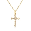 Detailed view of 18K gold plated cross pendant necklace with micro-set zircon stones - White