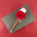 Christmas neutral pen featuring a fluffy red pompom and a smiling Santa Claus topper - Santa Claus-2