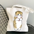 Kawaii white canvas tote bag featuring a cute brown striped cat print and dual handles - Brown White Tabby with Red Ornament
