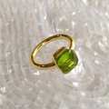 Detailed close-up of a gold square ring set with an emerald-green zircon stone - Gold Base: May-Grass Green