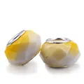 DIY charm set featuring two faceted yellow gradient beads with silver metal cores - Yellow White Spotted Faceted
