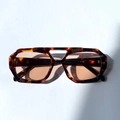 Vintage tortoiseshell double-bridge oversized sunglasses with brown lenses on white background - Demi Frame Light Tea Lens
