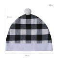 Detail of Christmas plaid hat decoration with dimensions 32x34cm and soft white pom-pom - Black White Grid