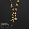 14K gold plated stainless steel necklace with pink crystal and letter L heart charm. - Letter L (XNL0097)