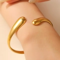 Polished gold adjustable open cuff bracelet with sleek teardrop ends for women - Water Drop Design (4719) / 18k Gold