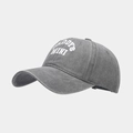 Close-up of DADDY'S MINI print on washed grey cotton baseball cap with curved brim - Adjustable / Gray