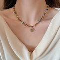 Tiger eye sun pendant necklace with boho beads worn on a model's collarbone - Bohemian Beaded Sun Pendant (9# Necklace-Gold)