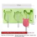 Green 3-cavity silicone ice cream mold featuring cartoon monsters with reusable sticks - 3-Cavity Monster - Random Multi-Color