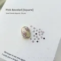 Close-up of pink 2mm square flatback rhinestones for nail art decoration on display - Pink Square 2x2 (XY-1013)