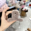Plush brown faux rabbit fur claw clip for thick hair in a cozy autumn winter style - Khaki