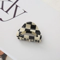 Macro shot of checkered claw clip with glossy finish on a minimalist white background - Black & White Large Checkerboard 4.5cm