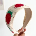 Knotted knit headband featuring red strawberry pattern on cream white fabric - Strawberry Flat Knitted Headband