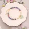 Buntes Heishi-Perlenarmband im Boho-Stil mit Herzanhänger und goldenem Verschluss - 1# Gepunktet Bunt