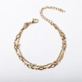 Detail of gold double-layer chain bracelet featuring hollow diamond shapes and beads - 17+5cm / Cross Bead Chain + Hollow Rhombus Bracelet / Gold