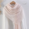 Light pink cotton linen wrinkled scarf draped over a wooden hanger for women - Sakura Pink